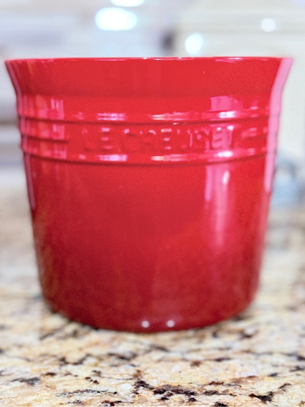 Le Creuset large Red Utensil Crock and white Utensil holder